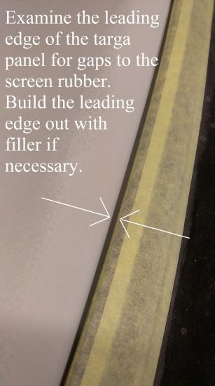 Check leading edge of targa panel for neat fit